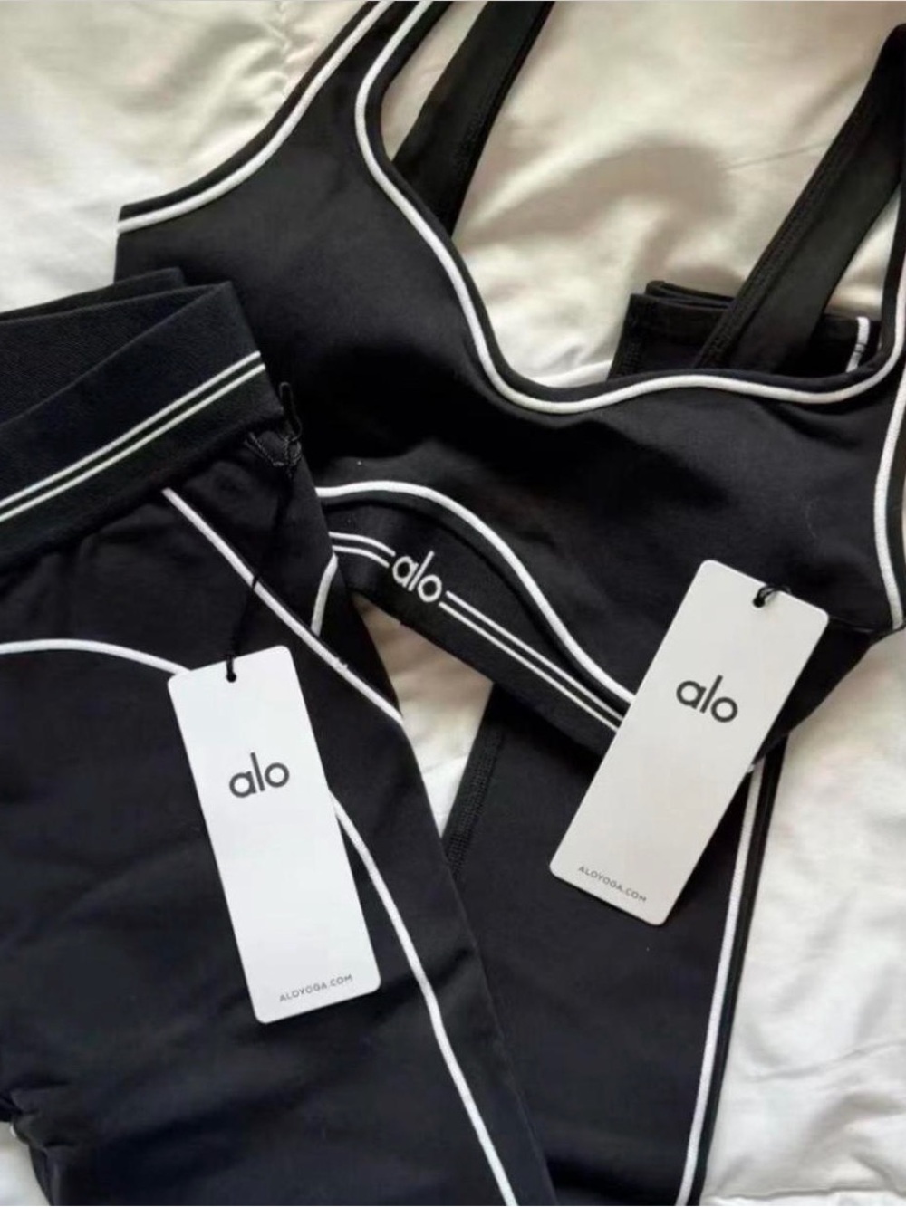 ALO Yoga Black two piece Leggings set with White Piping